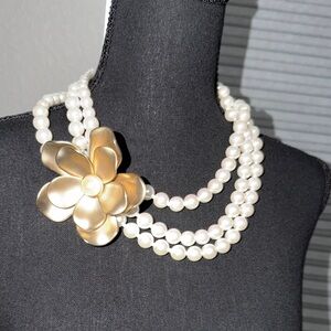 🫶🏼Pearl Triple-Strand Necklace with Gold Flower Accent by Nazasha